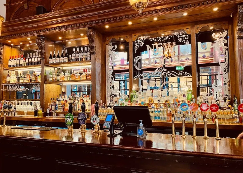 The inside of New Moon, a London pub