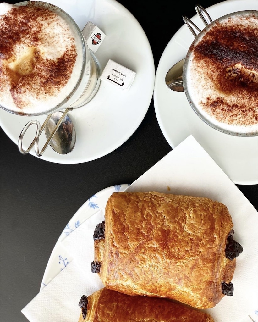 A croissant and coffee at La Mascotte restaurant - Paris, France