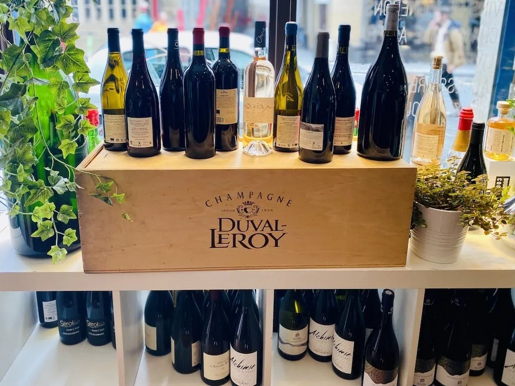 A wine display inside Les Caves du Louvre wine shop