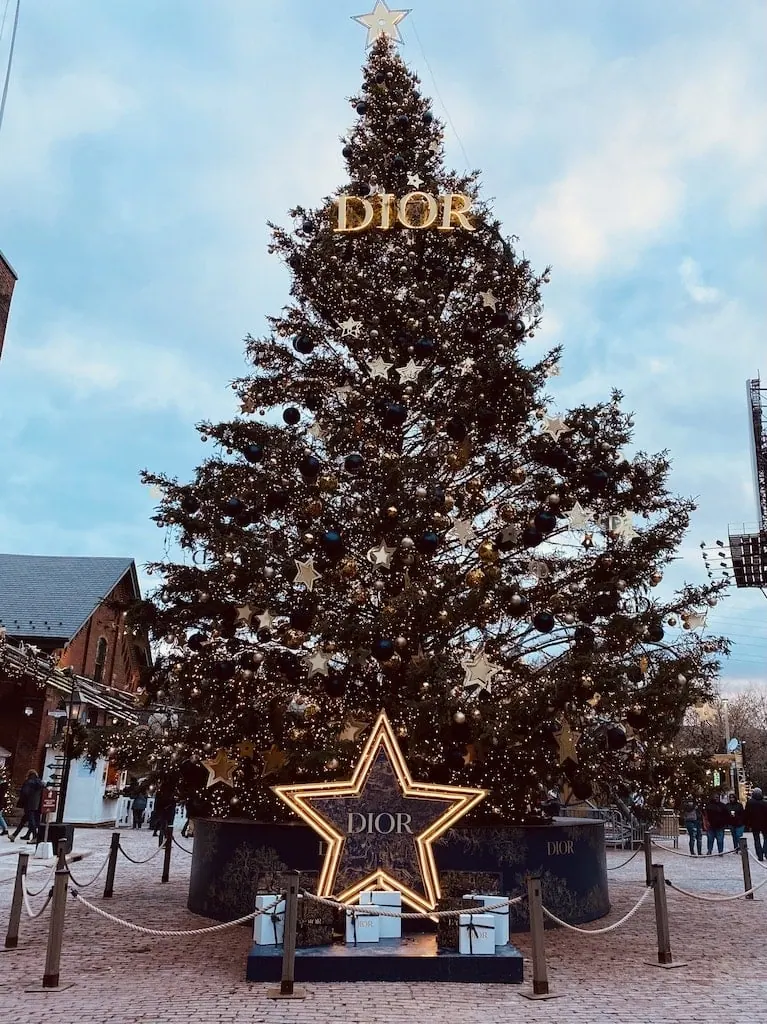 The Christmas tree in the daytime at Distillery Winter Village in Toronto, CA