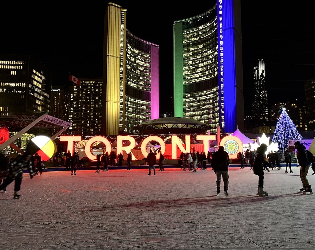 Ice skating at Nathan Phillips Square in Downtown Toronto