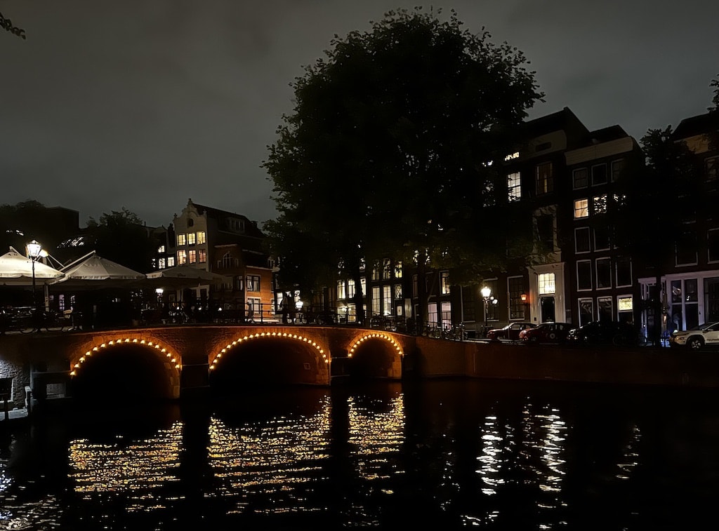 Torensluis Brug (Tower Bridge) at night in Amsterdam, Netherlands