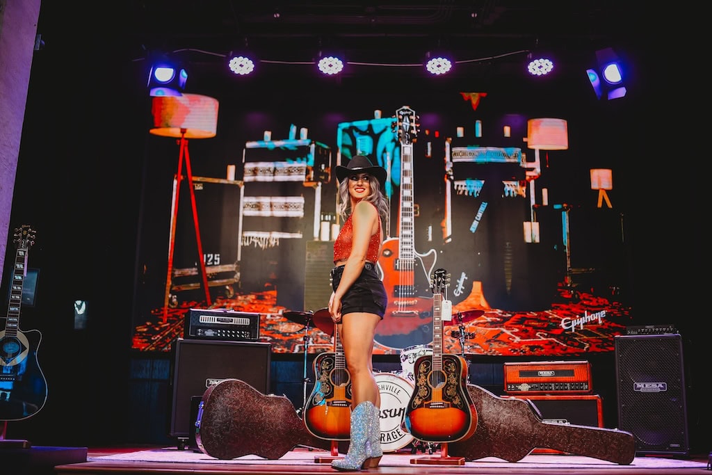 Photo of a girl on stage at Gibson Garage Nashville during a musician photoshoot