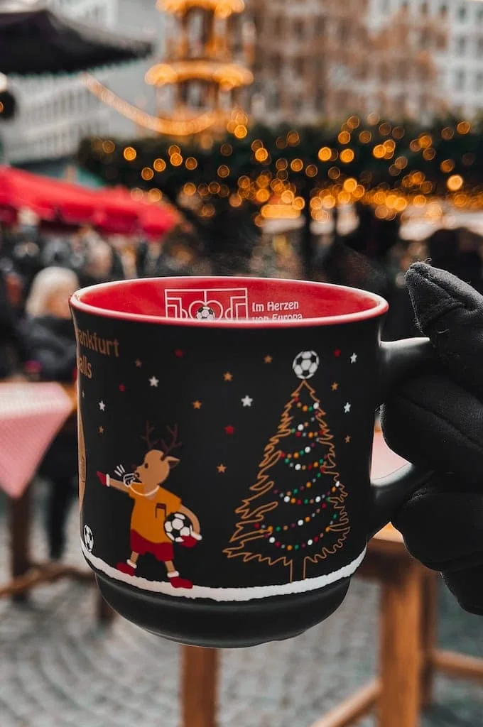Enjoying a cup of Apfelwein; Frankfurt, Germany
