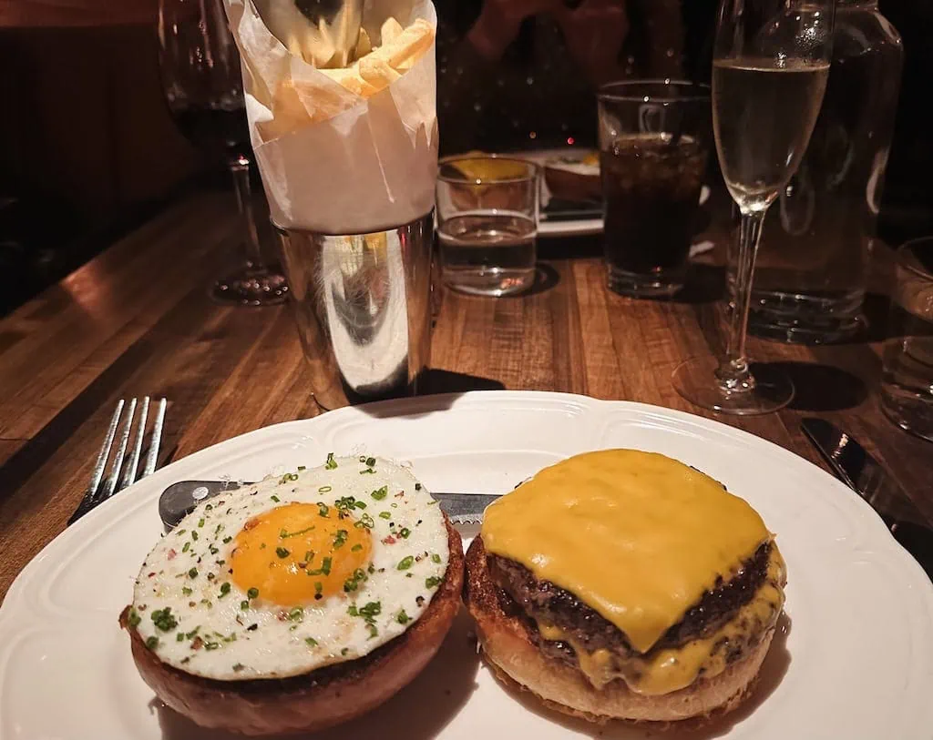 The burger (with fried egg!) at Au Cheval; New York City