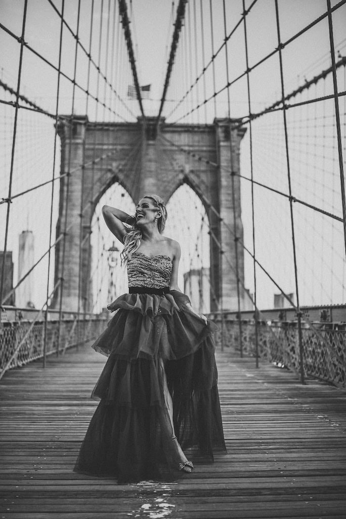 Girl in a tulle skirt on the Brooklyn Bridge, NYC