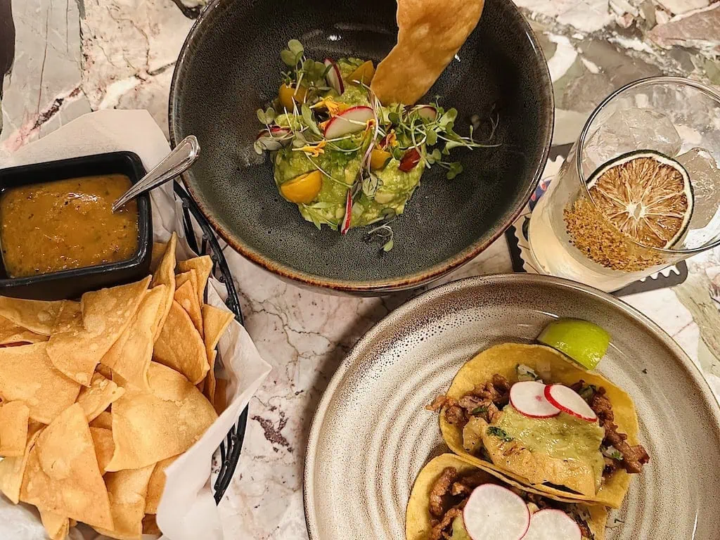 Pork tacos and guac & chips from Lolita in NYC