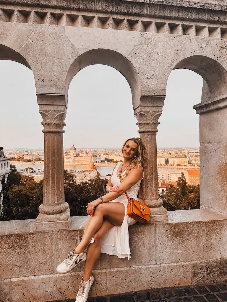 Girl sitting at Fisherman's Bastion in Budapest, Hungary