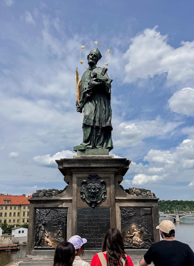 St. John of Nepomuk statue on Charles Bridge in Prague