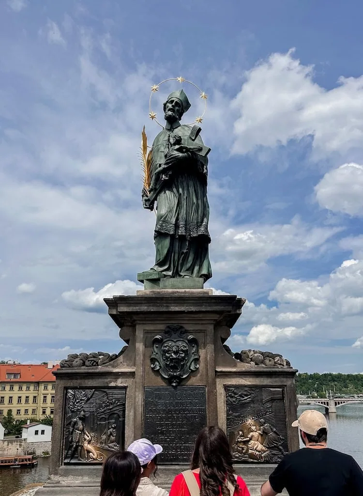 St. John of Nepomuk statue on Charles Bridge in Prague