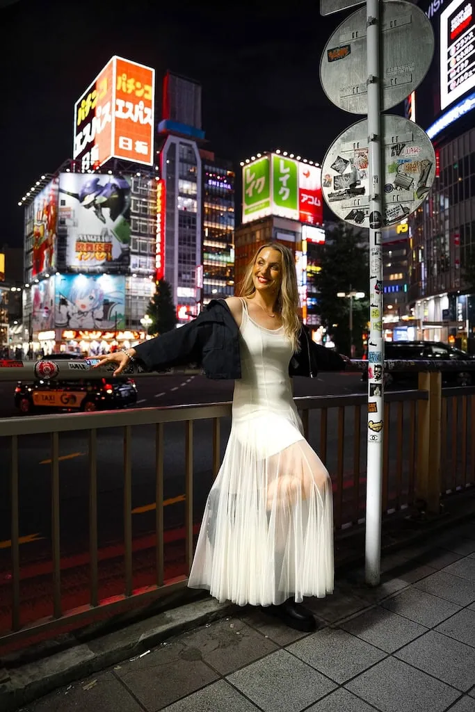 Girl in the middle of the downtown city center in Tokyo, Japan