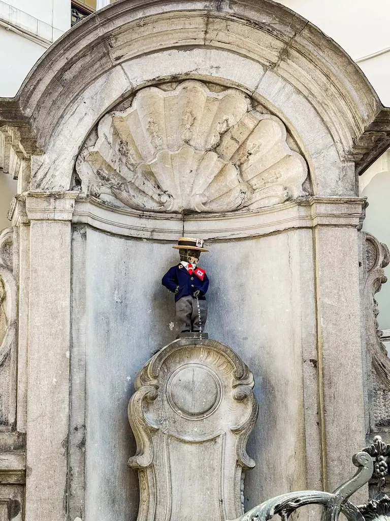 Mannekin Pis dressed for the Order of the Brussels Moustache competition in Belgium