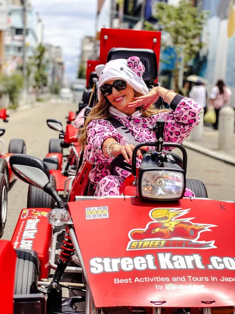 Girl driving a go-kart in Osaka, Japan
