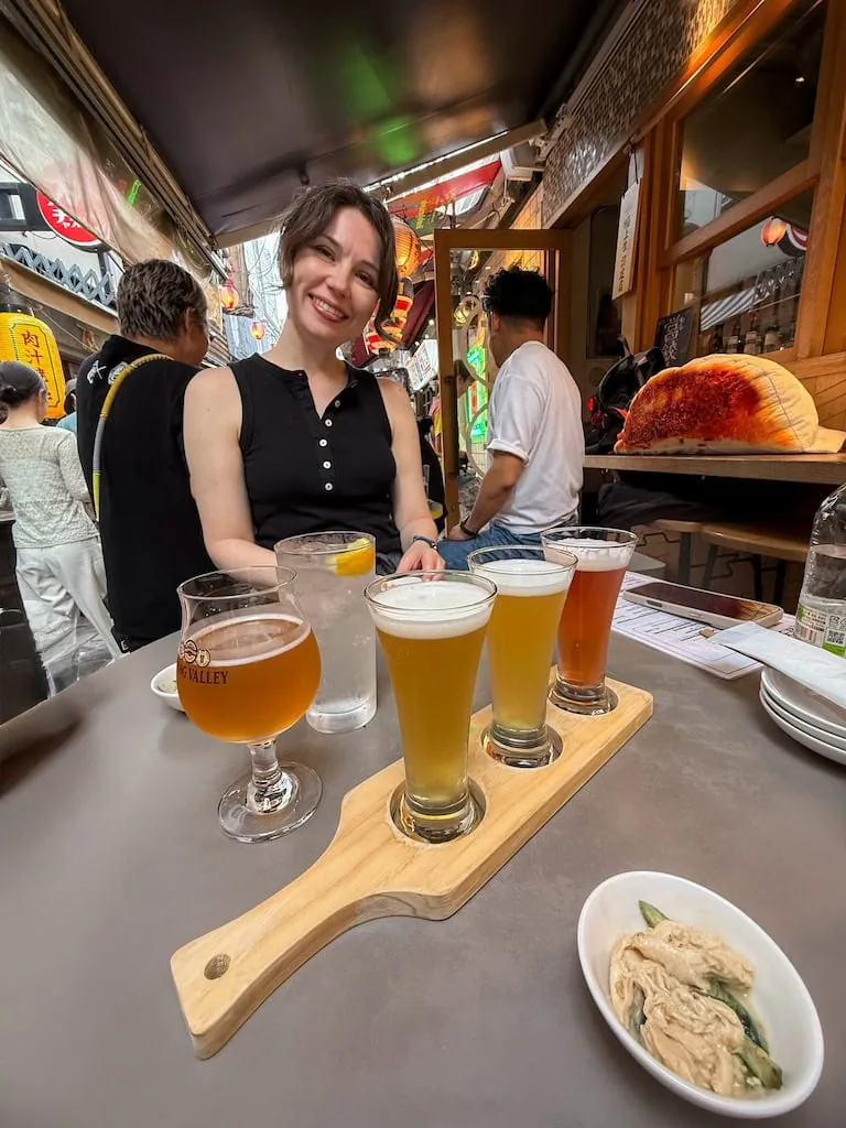 Girl with craft beer in Osaka, Japan