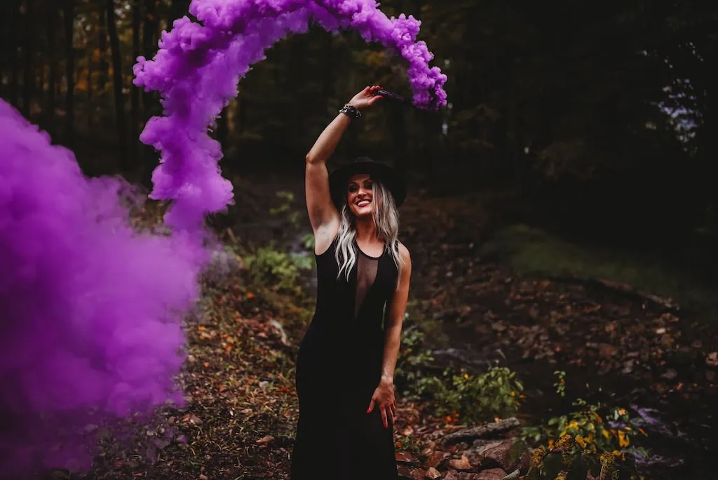 Girl doing a smoke bomb photoshoot